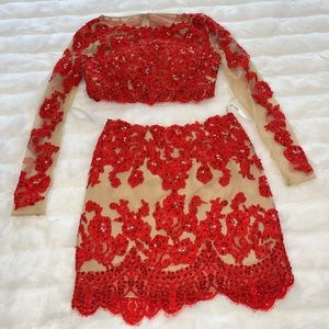 Sherri Hill 2 piece cocktail dress with sheer sleeves. Nude and red